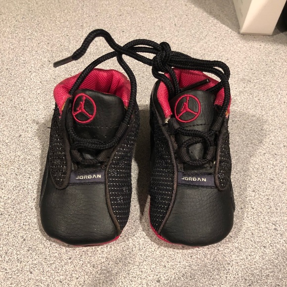 pink and black baby jordans